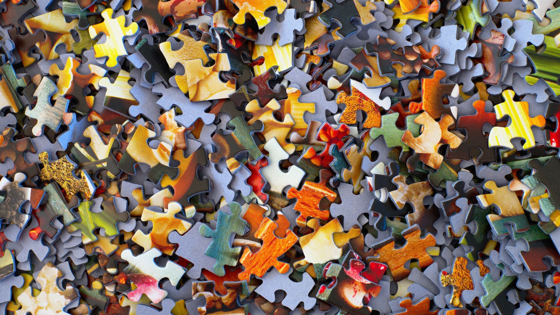 stack of jigsaw puzzle pieces