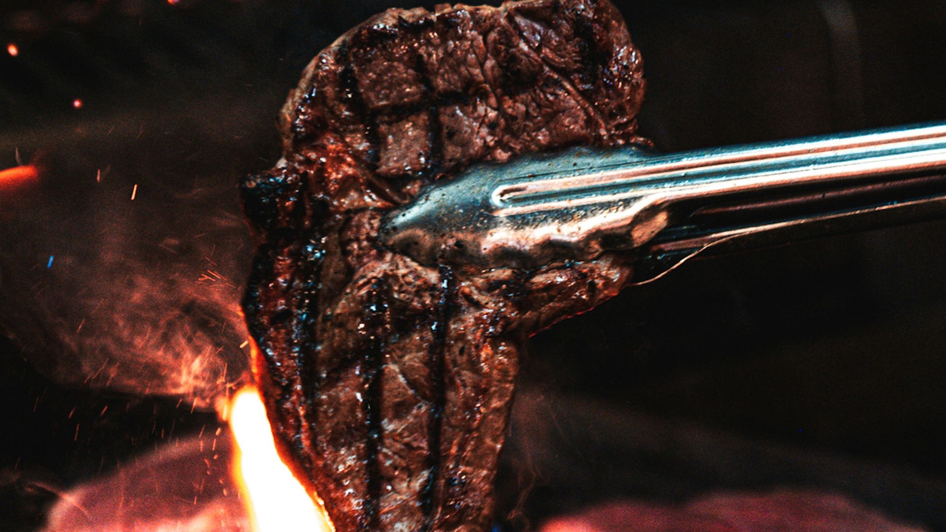 silver fork on fire during night time
