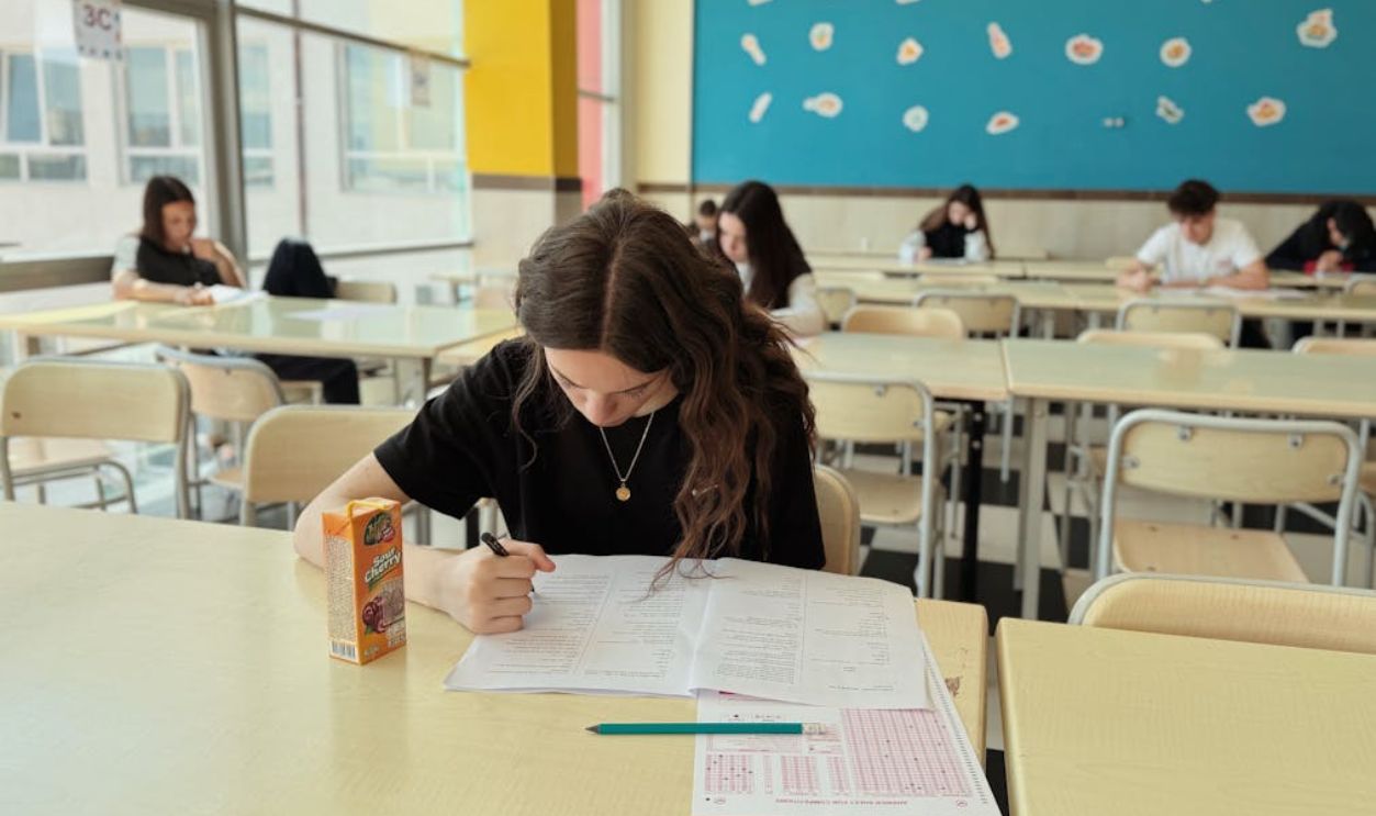 Focused Student Taking Test in Classroom