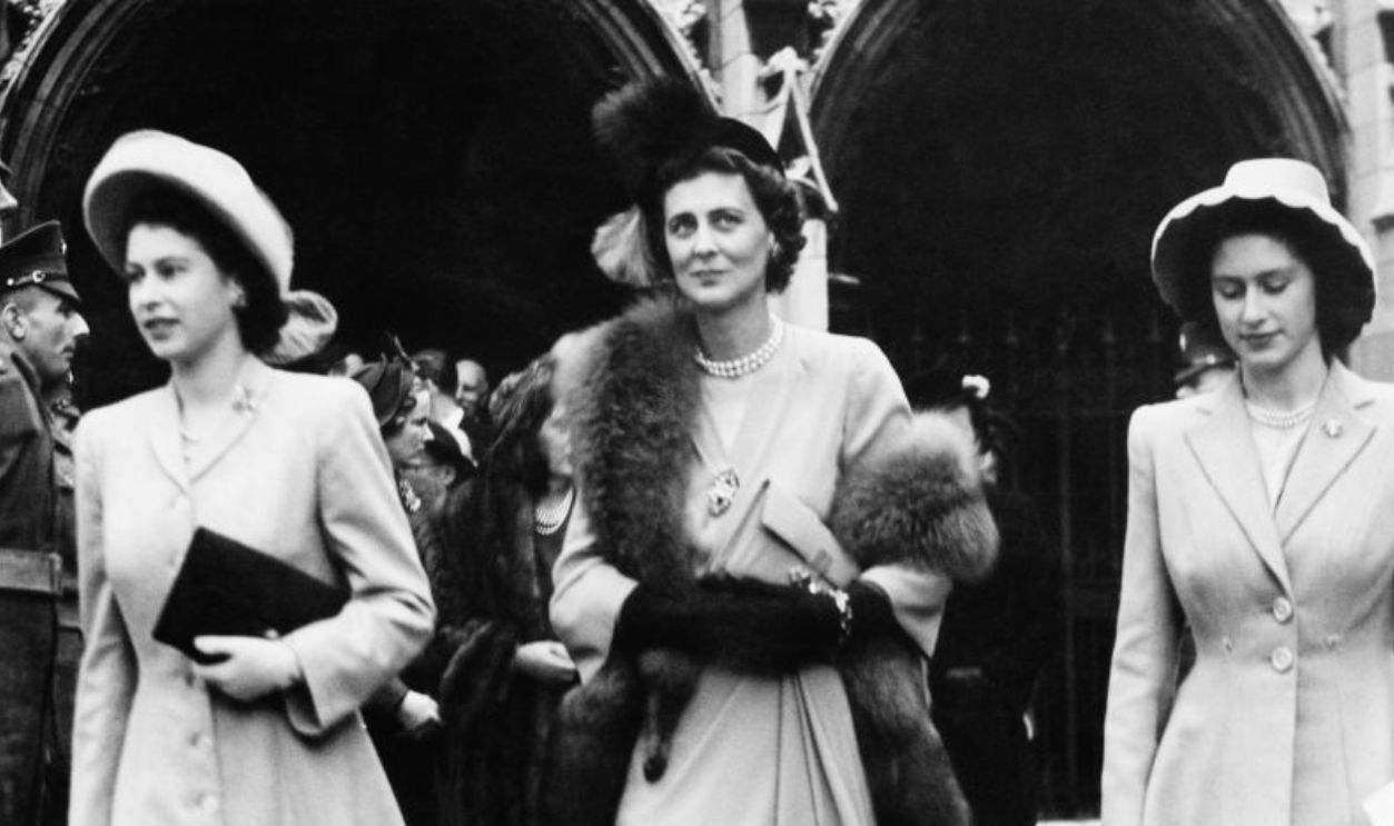 Left to right: Princess Elizabeth (later Queen Elizabeth II, Princess Marina, Duchess of Kent (1906 - 1968) and Princess Margaret (1930 - 2002) leaving St Margaret's church, Westminster, after the wedding of Myra Wernher and Major David Butter of the Scots Guards, London, 5th November 1946. 