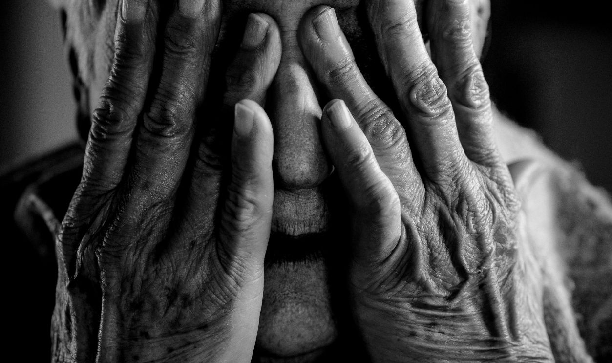 Thoughtful Senior Woman in Black and White
