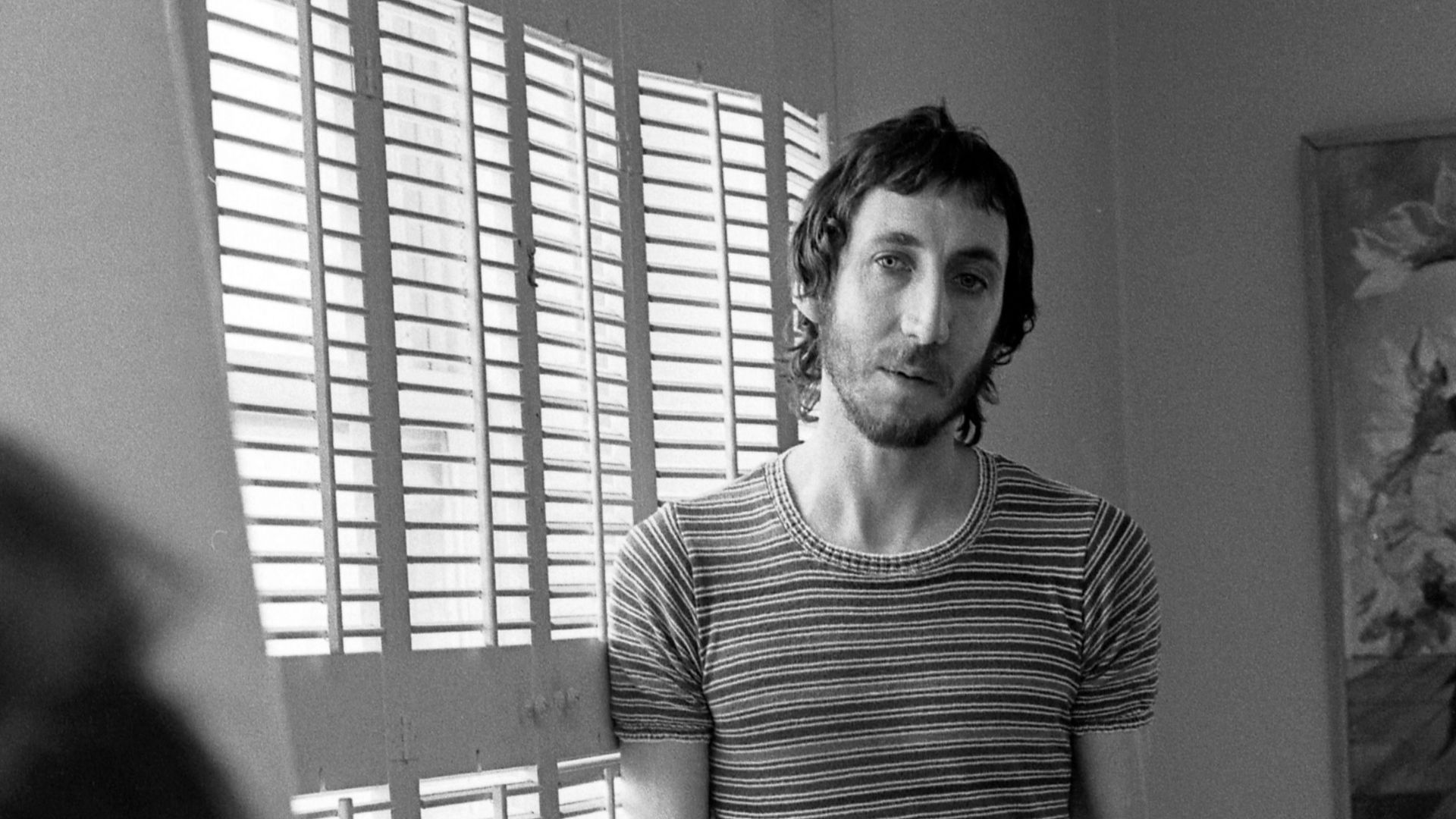 Musician Pete Townshend talking with Los Angeles Times reporter. 


Caption: