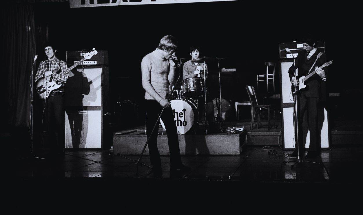 Gettyimages - 1211869357, British Band The Who Singer Roger Daltrey, bassist John Entwistle, drummer Keith Moon, and guitarist Peter Townsend from British band The Who on stage.