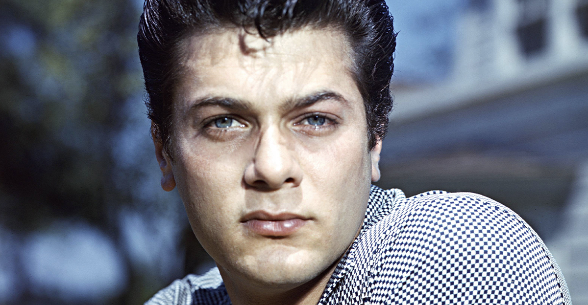 Tony Curtis (1925-2010), US actor, wearing a short-sleeved black-and-white check shirt, circa 1955.