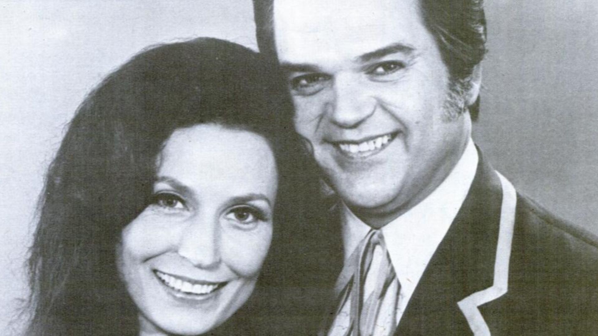 Trade ad for Loretta Lynn and Conway Twitty's album Country Partners .To better adapt it to his respective Wikipedia article, the ad was cropped and cleaned in a graphics editing program. The original can be viewed at the source below.