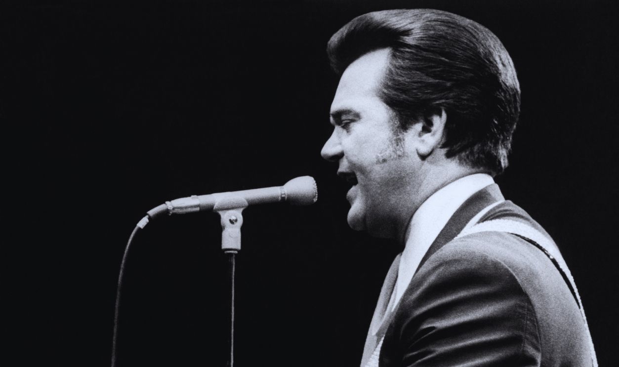 Gettyimages - 993783108, Conway Twitty Performs At MSG American Country musician Conway Twitty (born Harold Jenkins, 1933 - 1993) plays guitar as he performs onstage at Madison Square Garden, New York, New York, June 3, 1972.