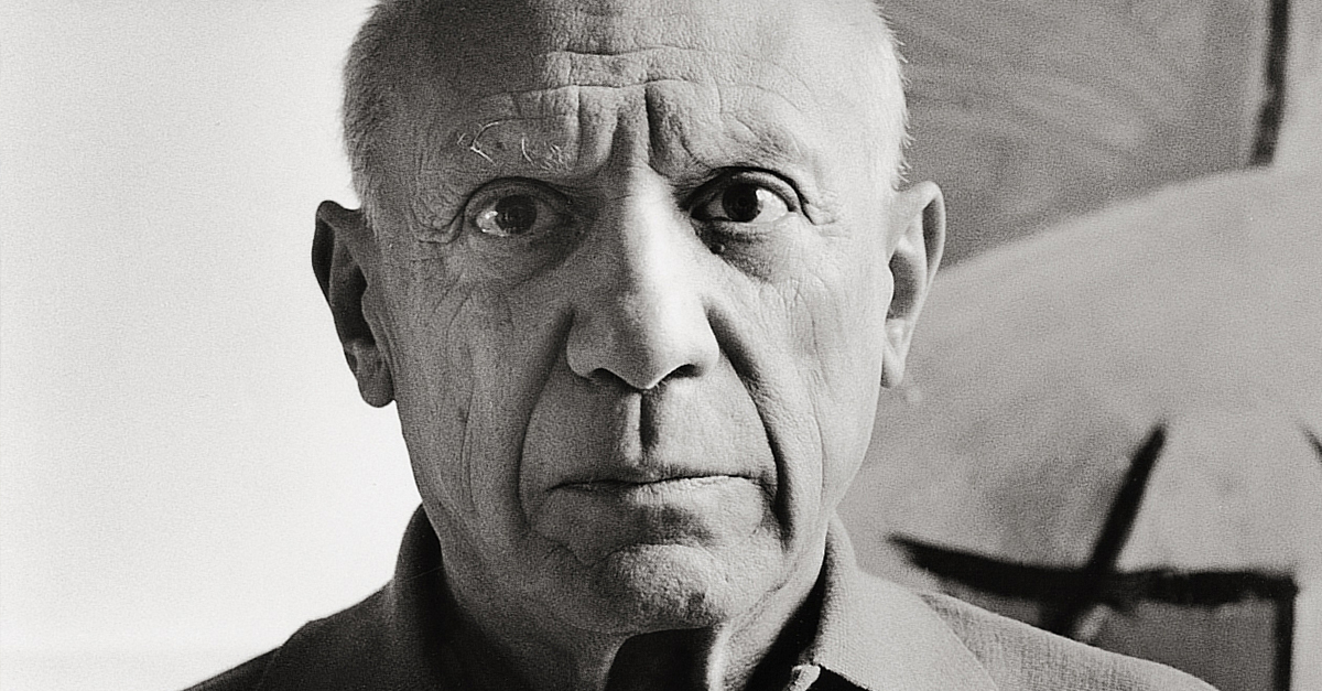 Portrait of Pablo Picasso, looking stern.