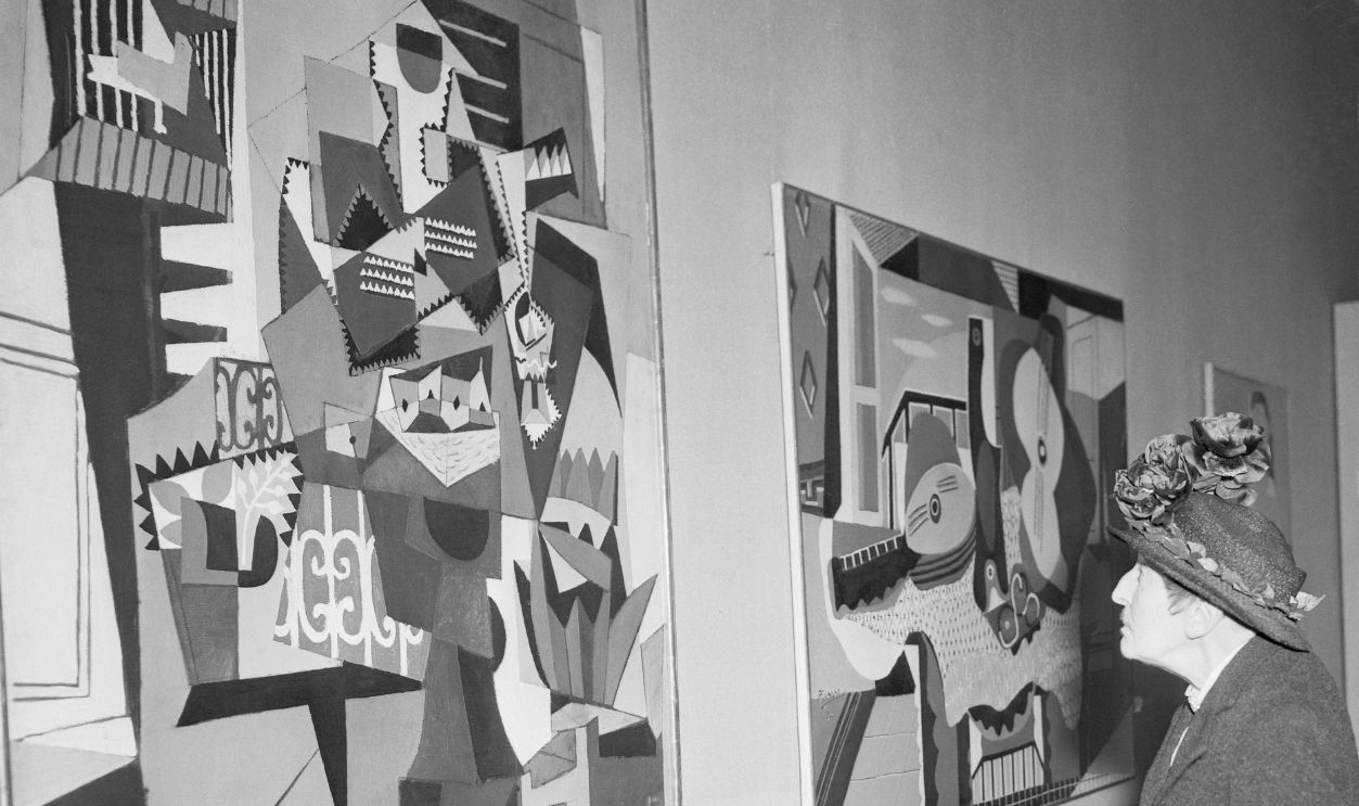 Gettyimages - 517367536, Alice Toklas Admiring Artwork (Original Caption) Paris: Her
