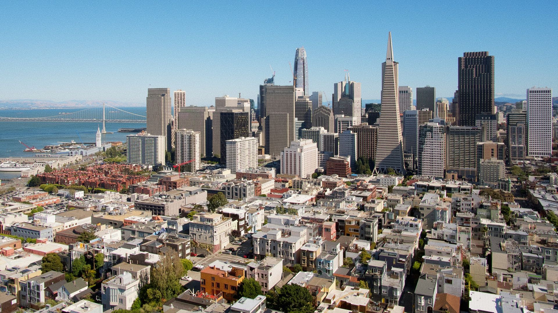 city buildings under blue sky during daytime