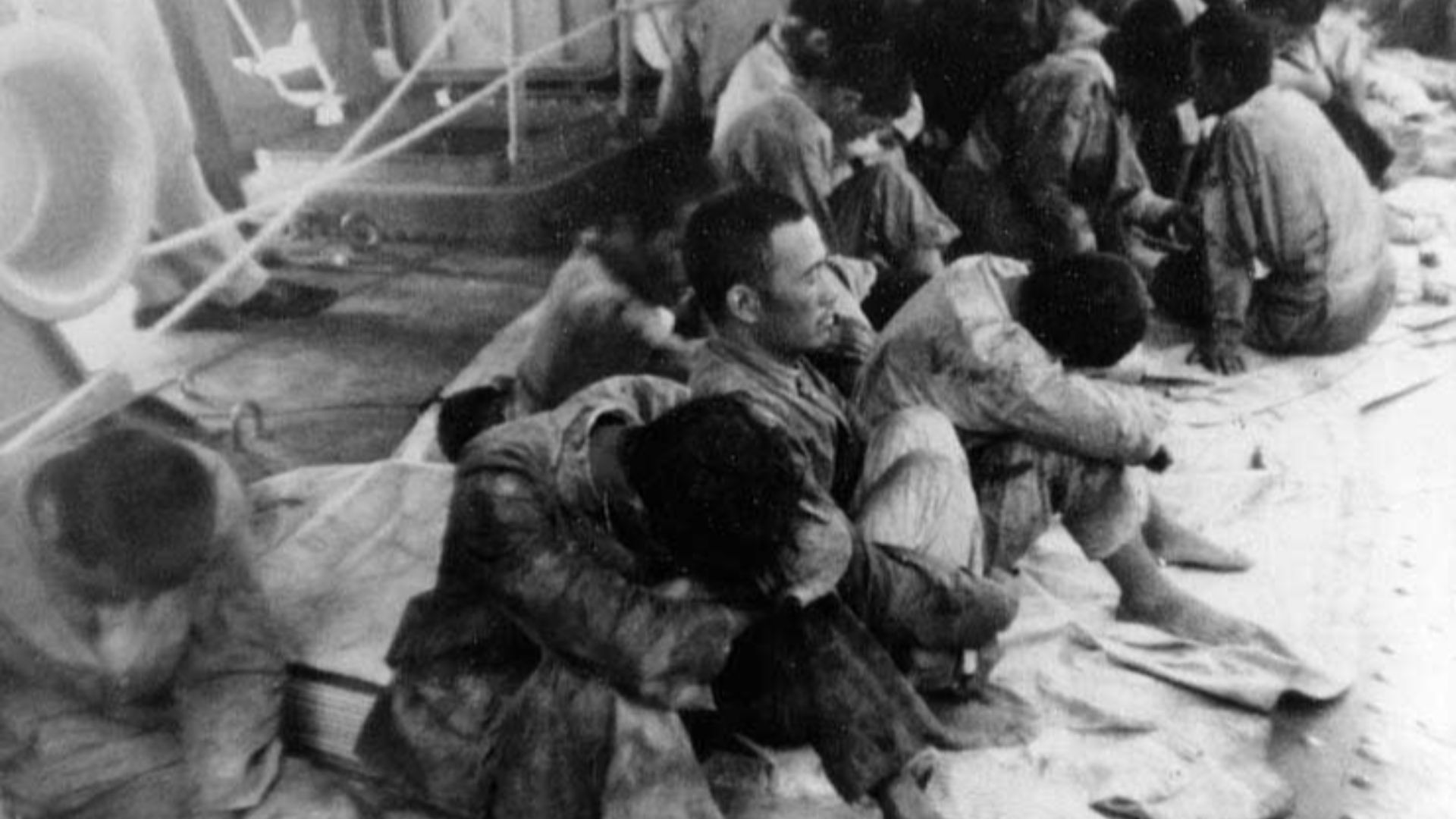 Japanese prisoners of war on board USS Ballard (AVD-10) after being rescued from a lifeboat two weeks after the Battle of Midway. They were members of the aircraft carrier Hiryu´s engineering force, left behind when she was abandoned on 5 June 1942, and had escaped in one of her boats just as she sank.