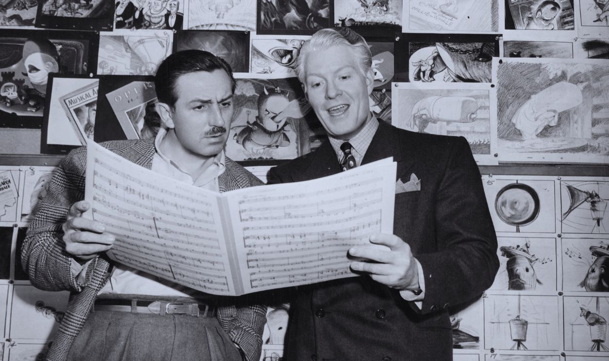 Gettyimages - 3288431, Make Mine Music circa 1946: American actor Eddy Nelson scrutinises a music score for the Disney film 'Make Mine Music', a programme of cartoon shorts.