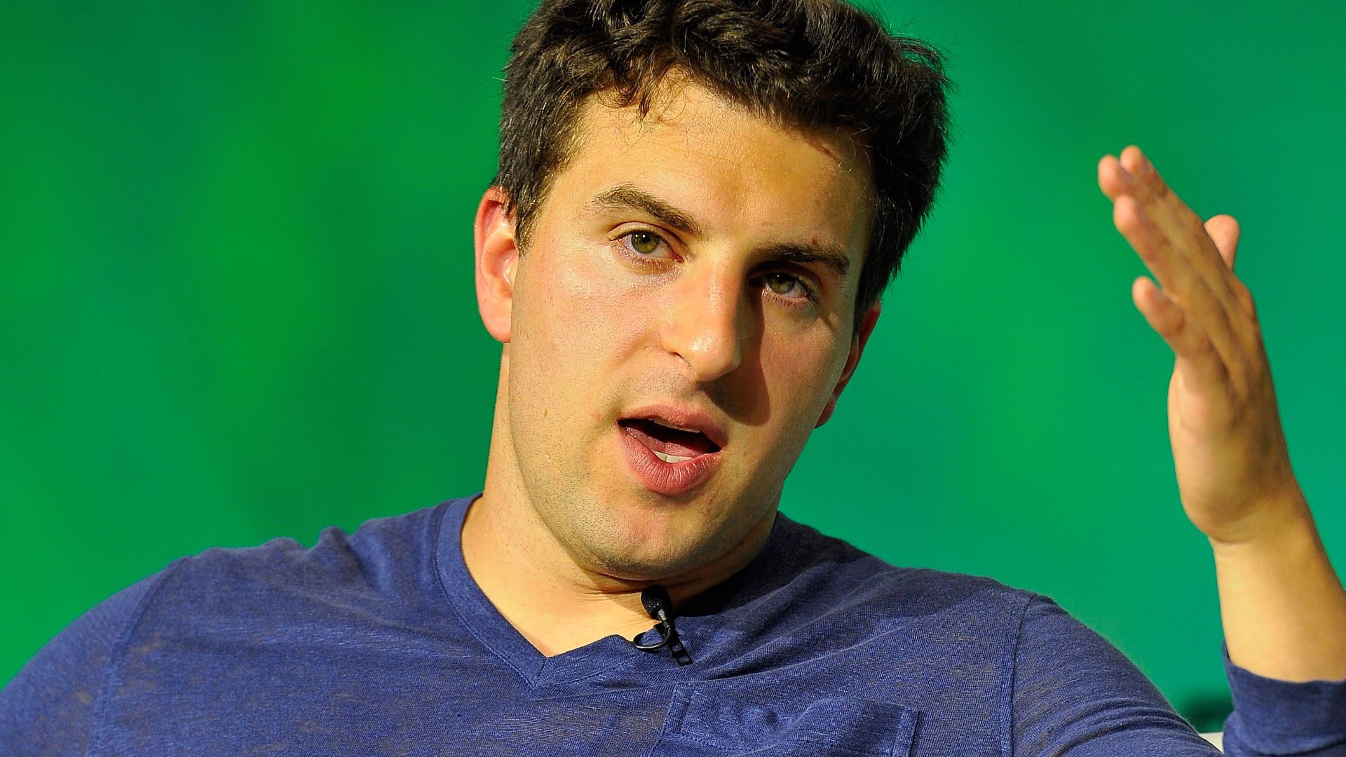 SAN FRANCISCO, CA - SEPTEMBER 09: Airbnb Co-Founder and CEO Brian Chesky speaks onstage at TechCrunch Disrupt at Pier 48 on September 9, 2014 in San Francisco, California. (Photo by Steve Jennings/Getty Images for TechCrunch)