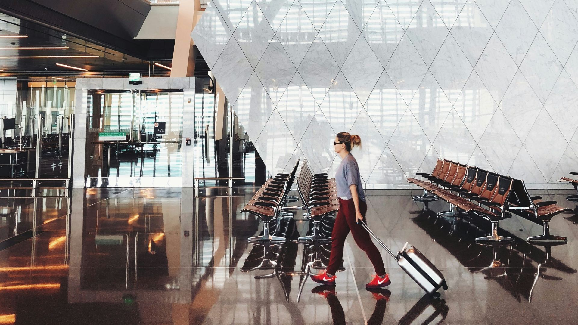 person walking inside aiport
