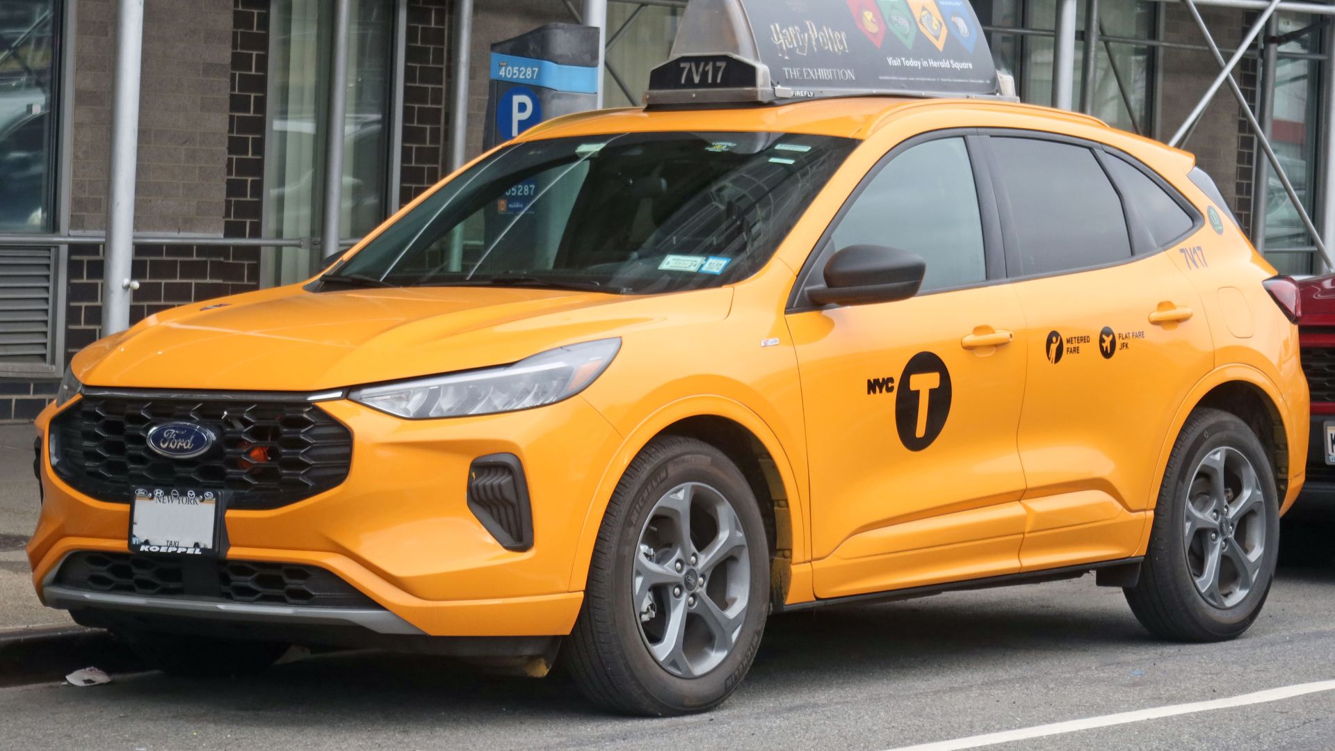A 2023 Ford Escape Hybrid (facelift) NYC medallion taxi photographed in Forest Hills, New York, USA. The metadata date of this image is inaccurate.