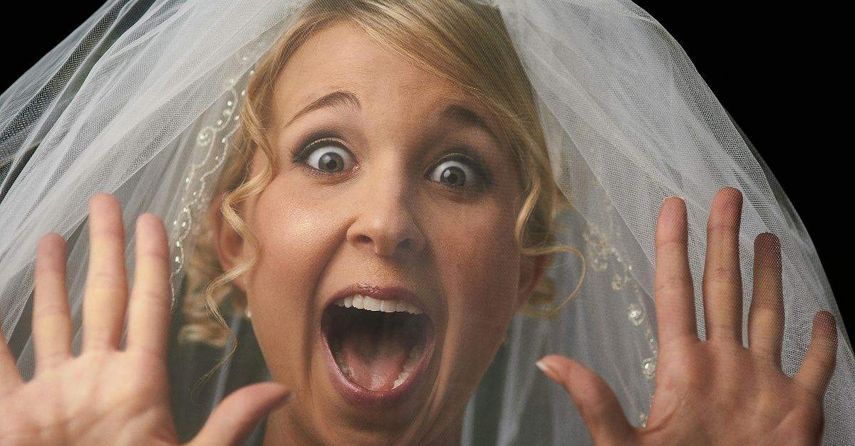 woman in white veil smiling