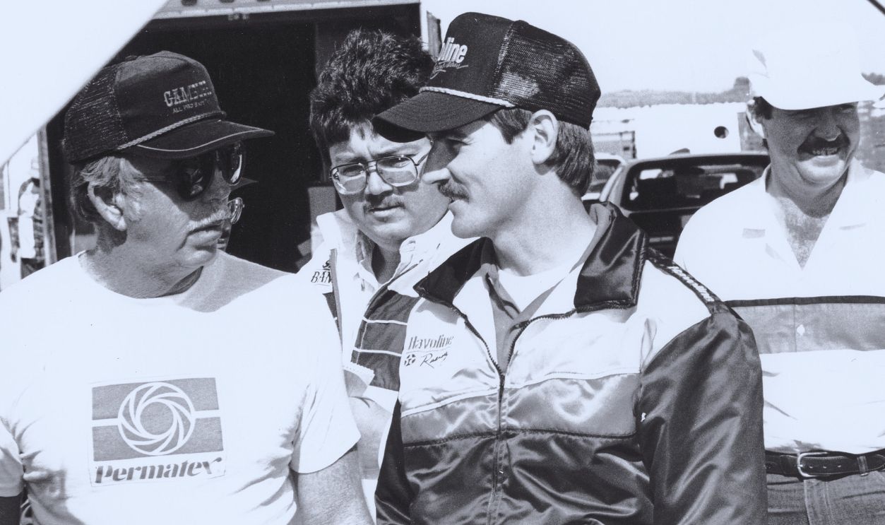 Gettyimages - 135795997, Red Farmer-Davey Allison Unknown: Red Farmer (L) a member of the “Alabama Gang” that included brothers Bobby and Donnie Allison, was a mentor to Bobby Allison’s son, Davey Allison, throughout Davey’s career and was crew chief on Davey’s NASCAR Busch Grand National racecars.