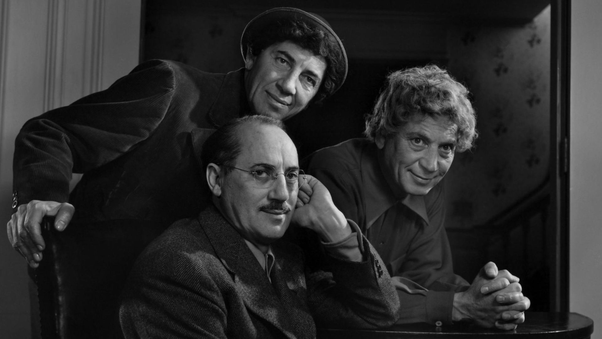 The Marx Brothers, (from left to right: standing: Chico, Harpo. sitting: Groucho)