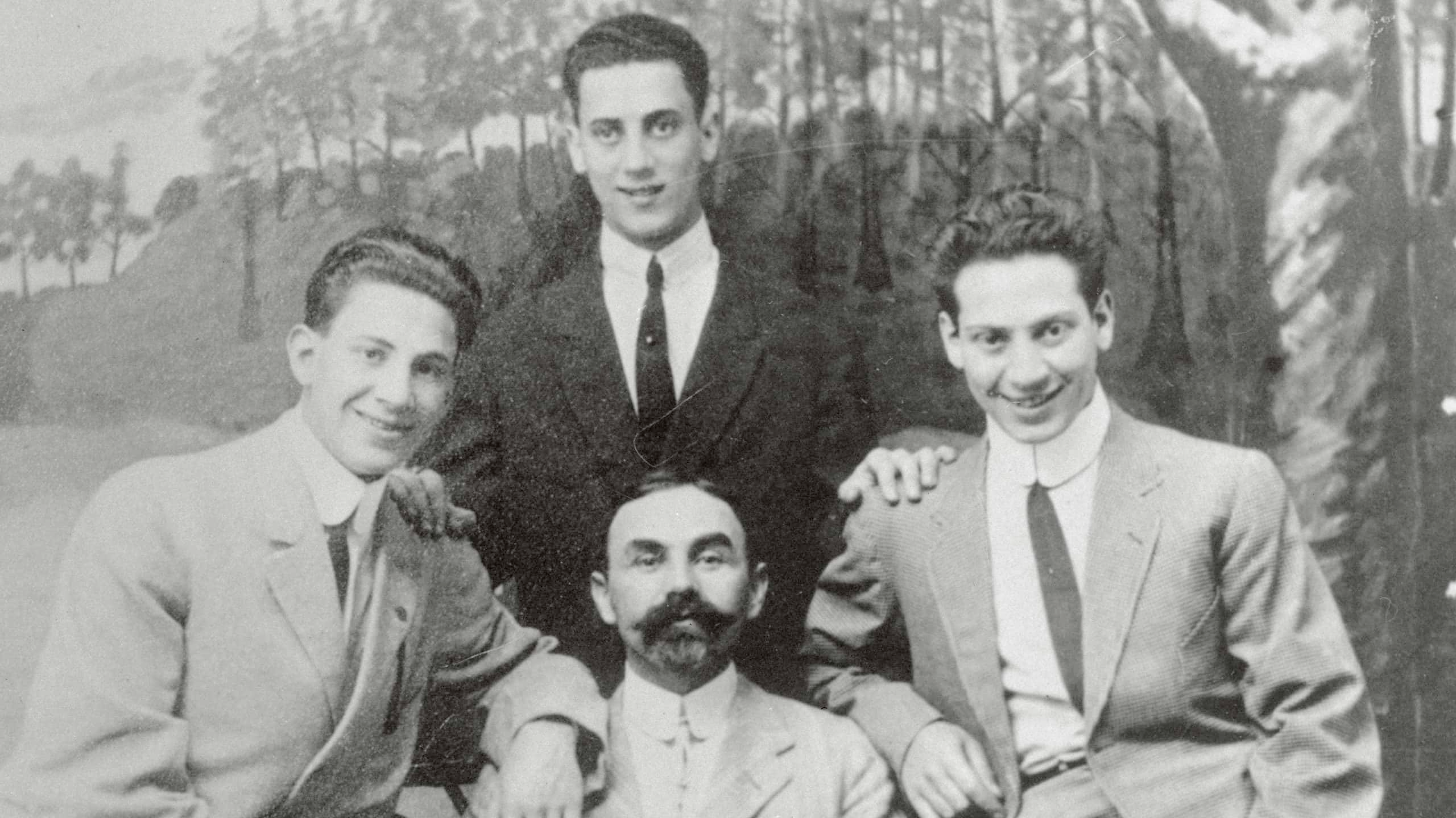 Gettyimages - 516510848, The Marx Brothers (Original Caption) Marx Brothers when they played in vaudeville under the name of The Three Nightingales. Left to right, Gummo; Julius Schickler, their uncle who served as manager; and Harpo. Standing is Groucho.