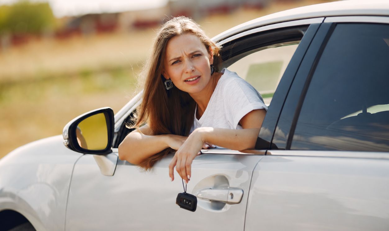 Confused Woman In A Car