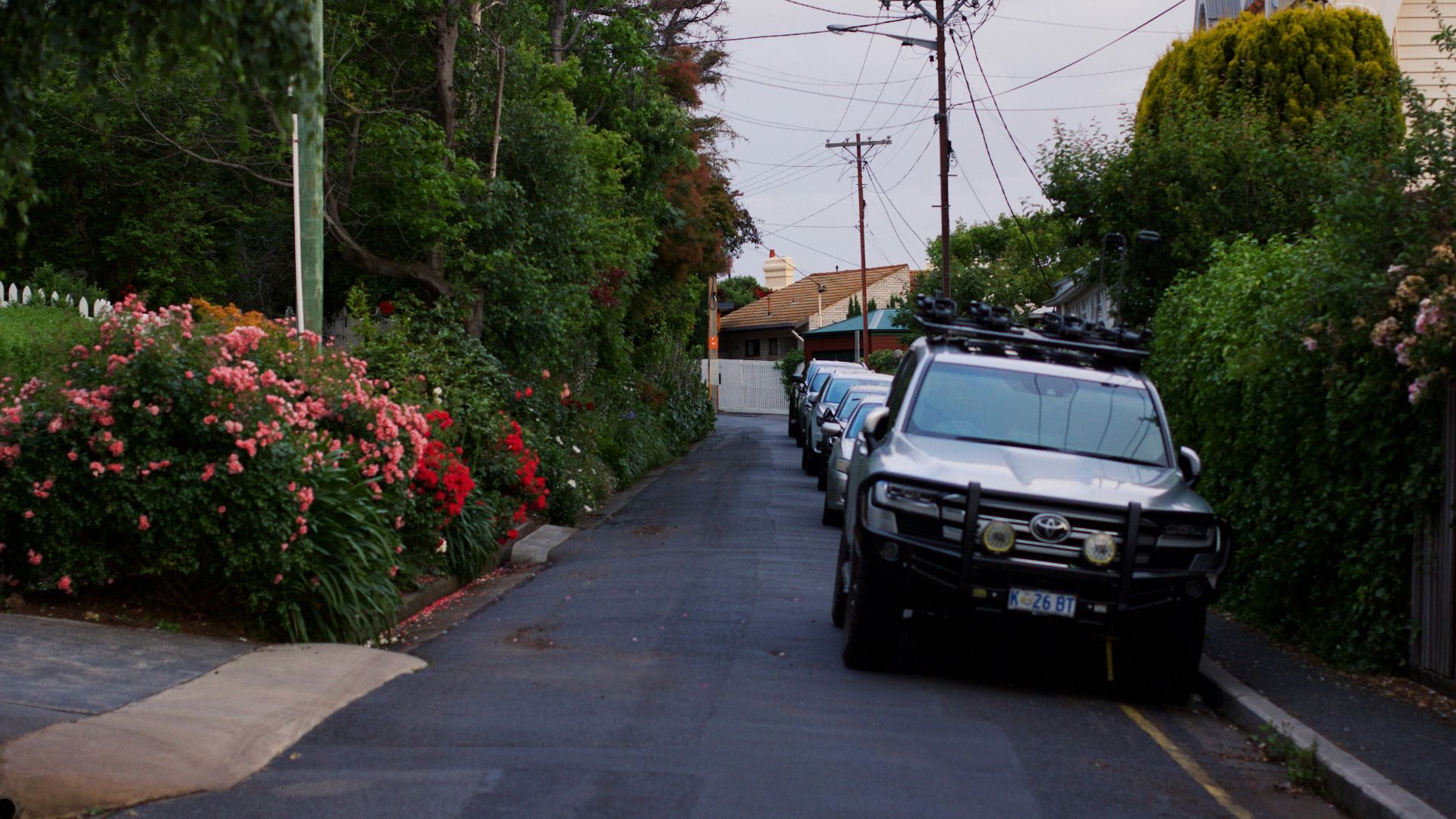 A car parked on the side of a road