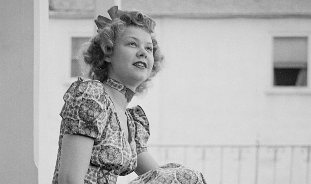 LOS ANGELES,CA - CIRCA 1940: Actress Vera Ellen poses on steps in Los Angeles, California.