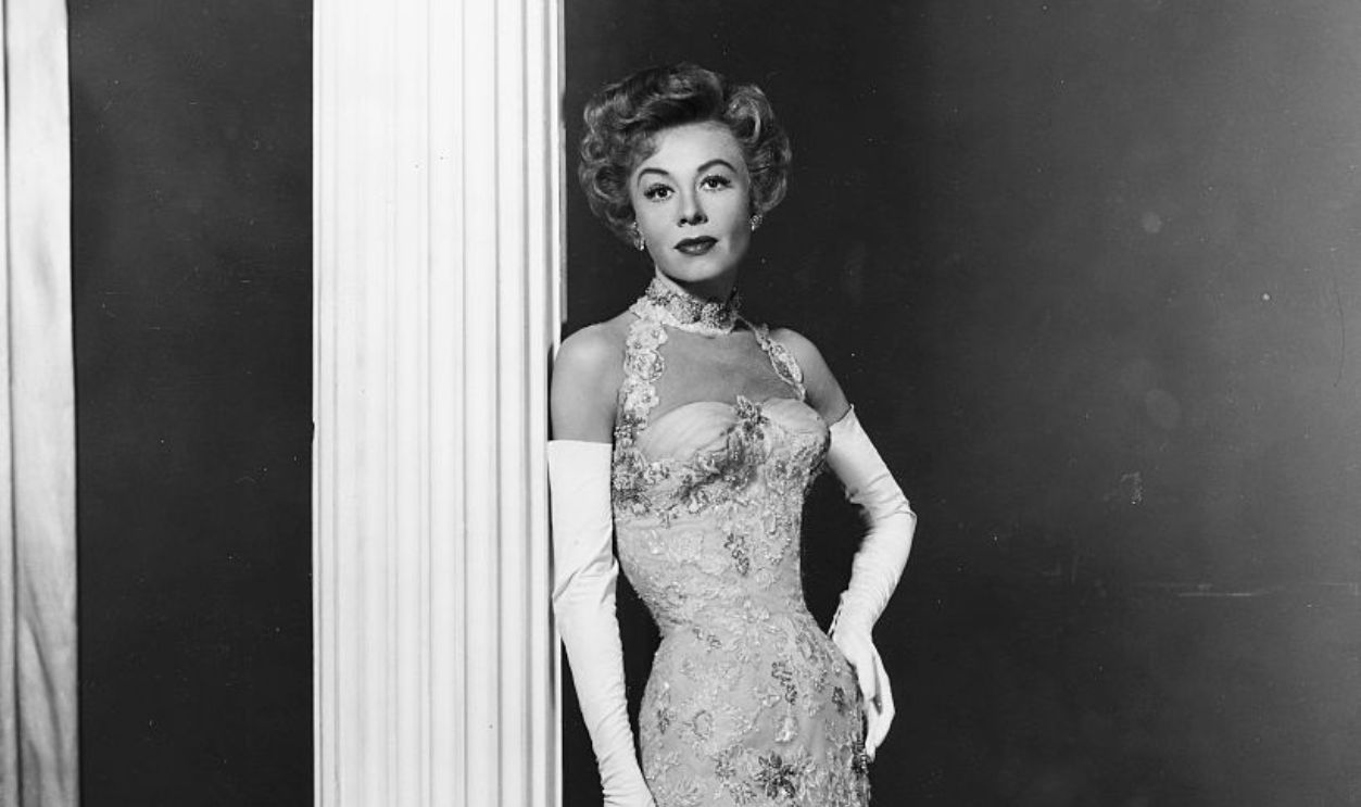 Portrait of actress and dancer Vera-Ellen wearing a ball gown, custom made for her for the Royal Film Performance, circa 1950. 
