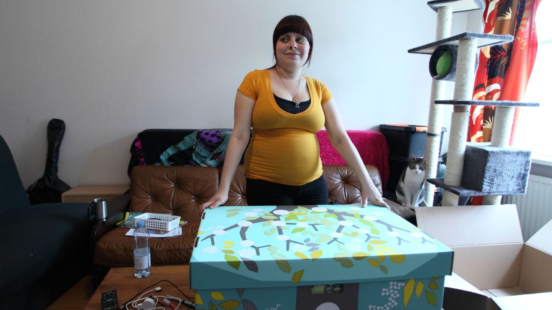 A mother expecting a baby receives the maternity package.