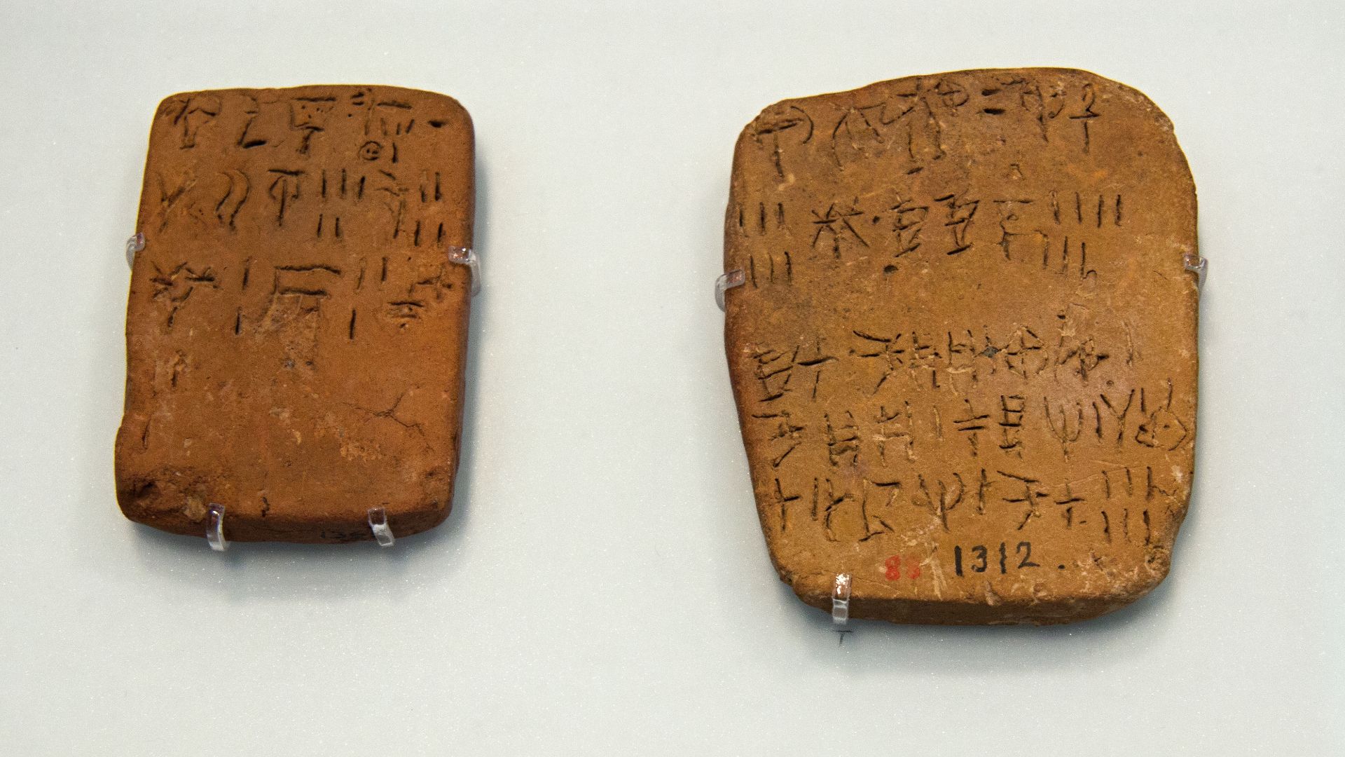 Linear A inscriptions on a clay tablets from Crete, probably 15th century BC. Archaeological Museum of Heraklion.