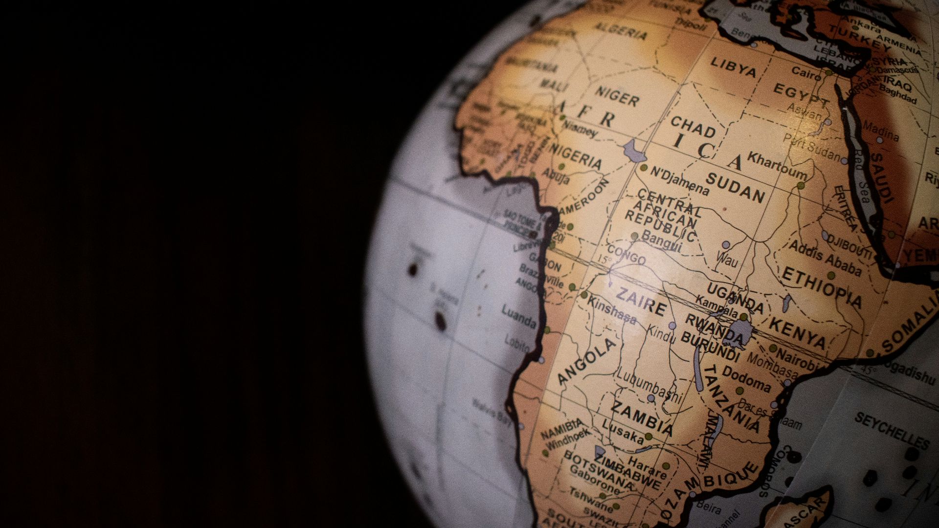 brown and black desk globe