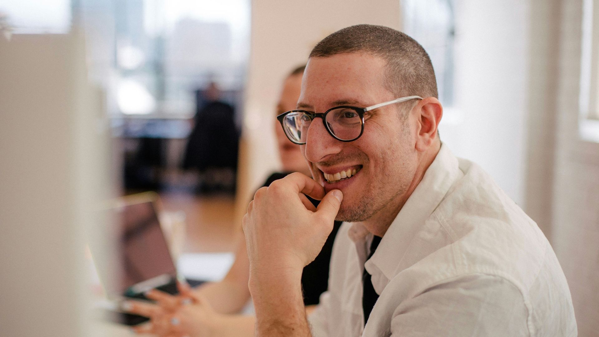 man smiling in room
