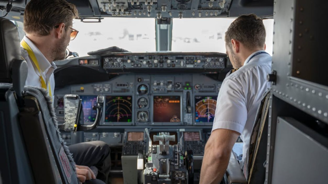 Two Pilots Sitting Inside Plane