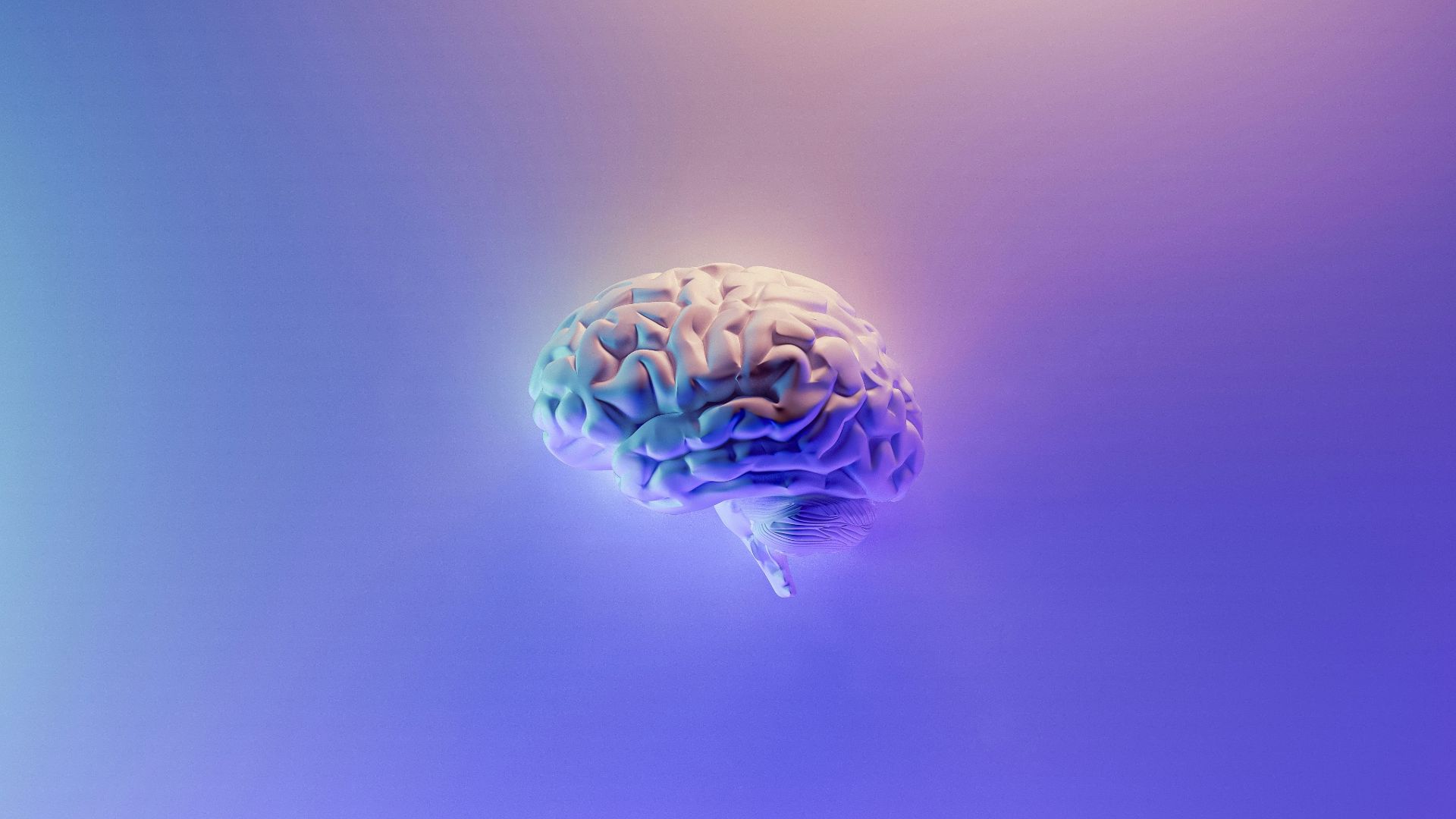 iridescent brain render on blue purple background
