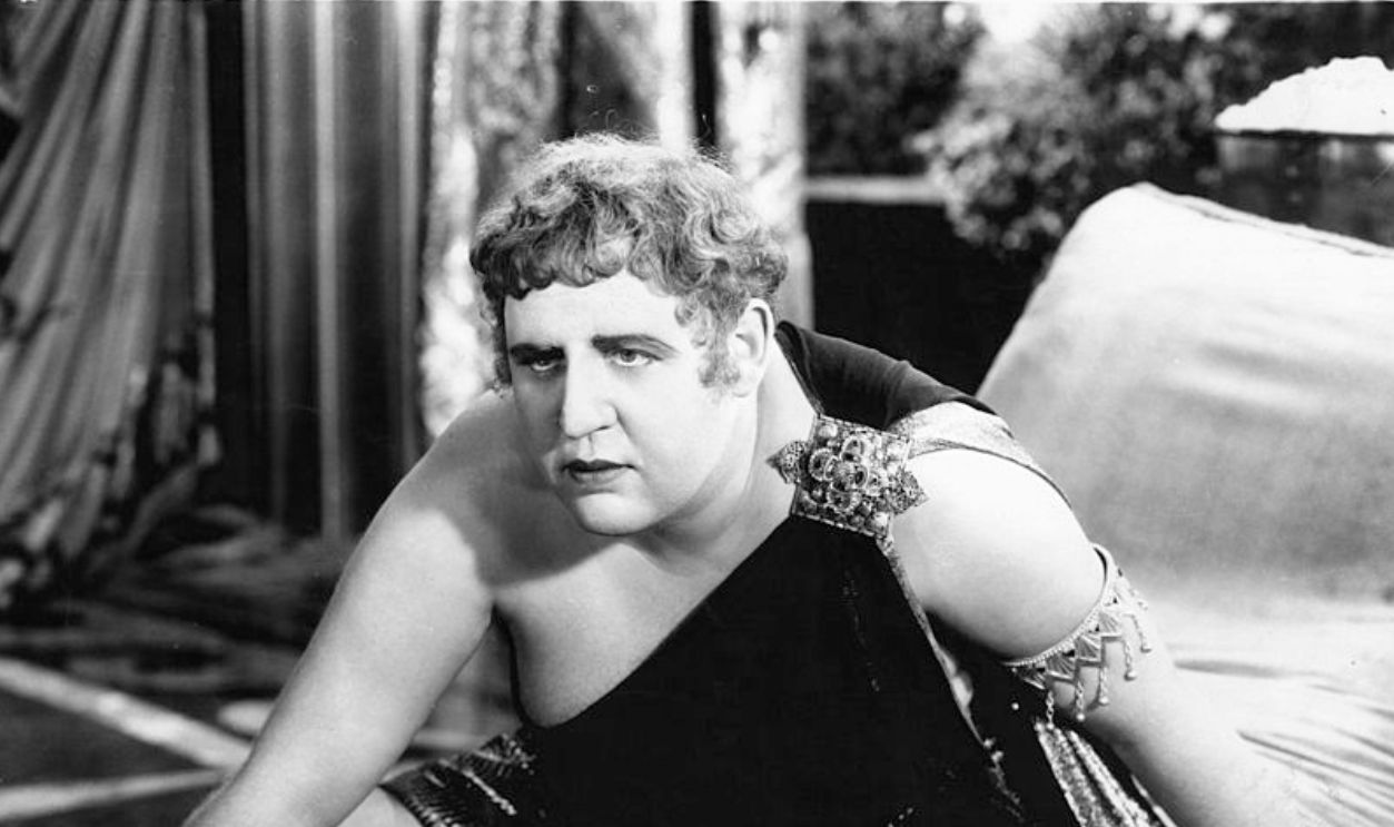 Charles Laughton on bed in a scene from the film 'The Sign Of The Cross', 1932.