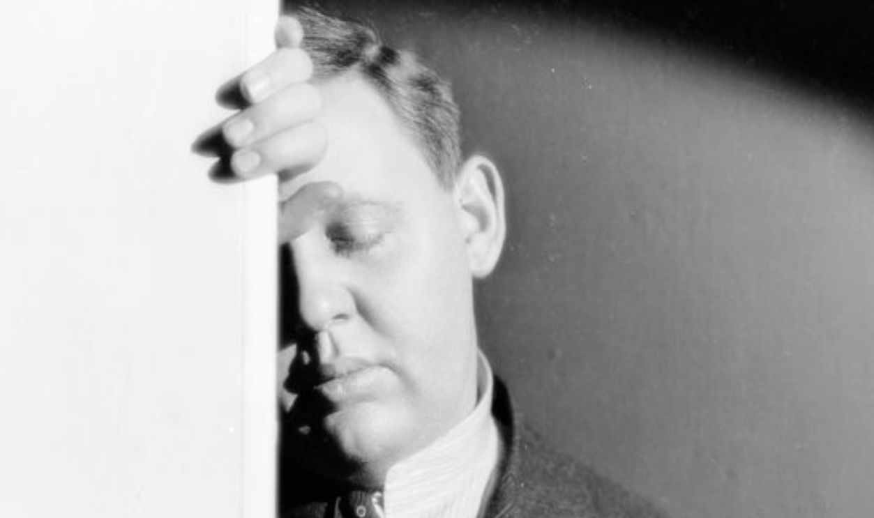 1932: English actor Charles Laughton (1899 - 1962) half obscured by a wall, and with his eyes closed in thought. 