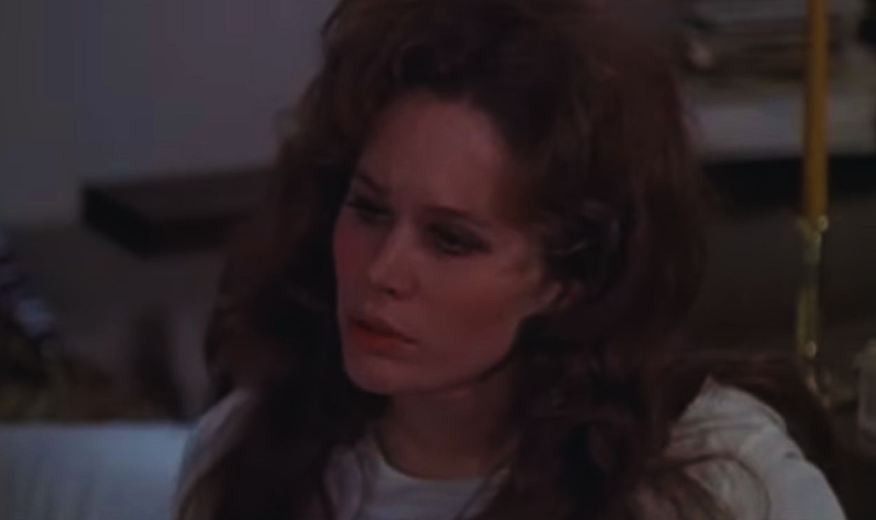 Screenshot from Born to Win (1971)
