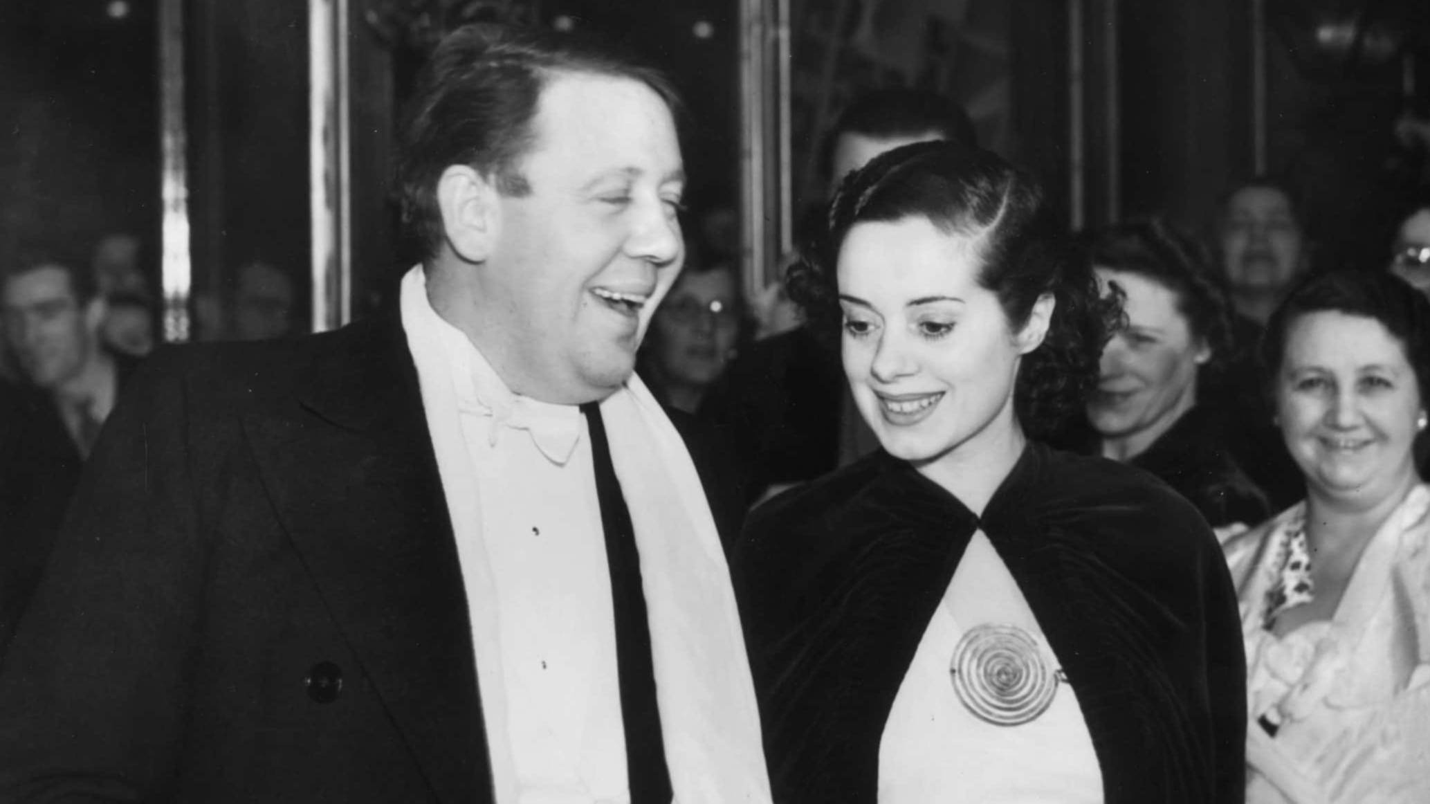 British actor, Charles Laughton (1899 - 1962) arrives with his actress wife, Elsa Lanchester (1902 - 1986) at the film premiere of 'Vessel of Wrath', aka 'The Beachcomber' at the Regal in Marble Arch, London.