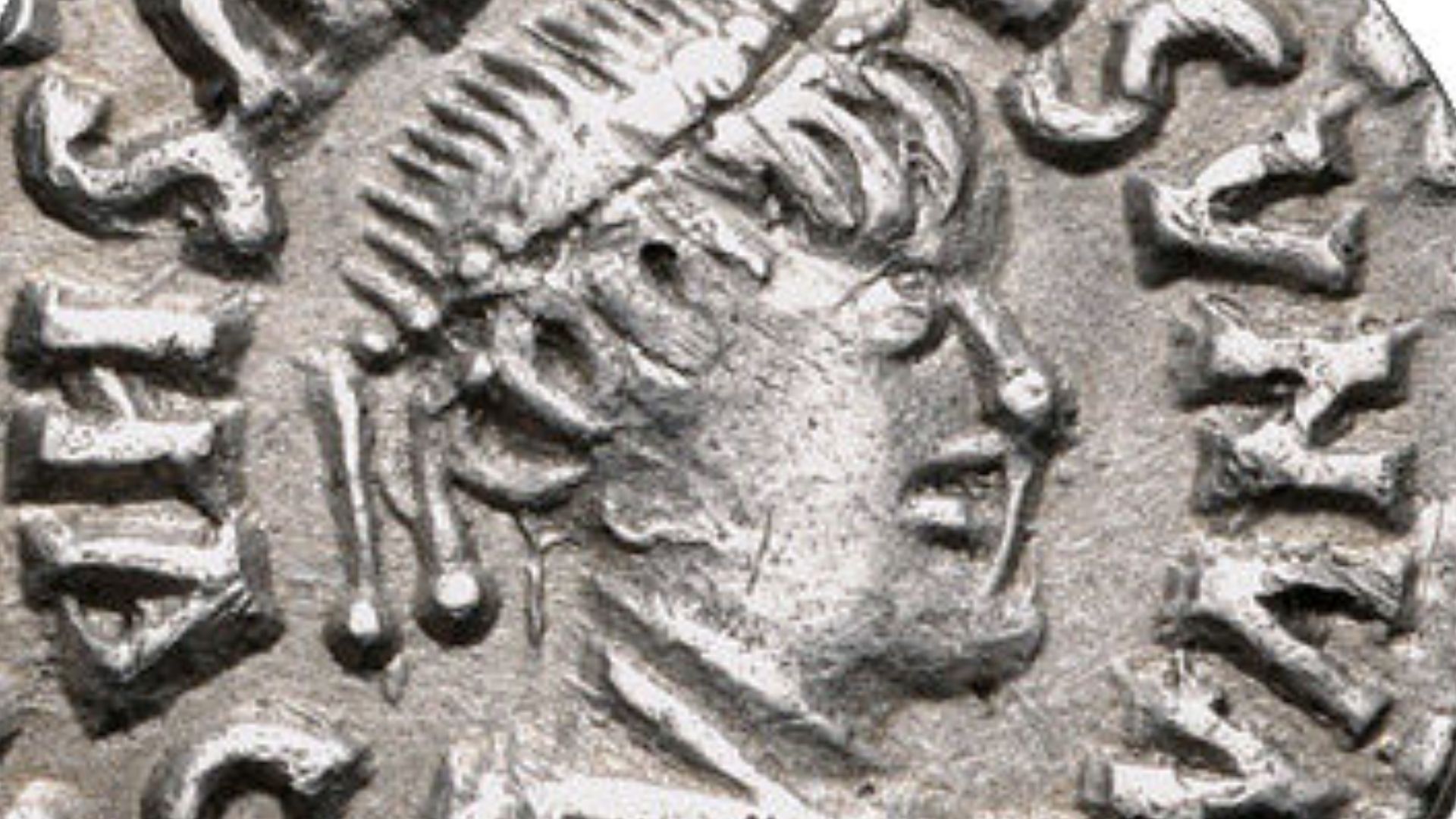 Coin of the Gepids 454-552 Sirmium mint. In the name of Byzantime Emperor Anastasius I 491-517 CE.  C N ΛNΛSTΛISVS И AC (first C retrograde, legend read outwardly), pearl-diademed and draped bust right / VICΓI RIΛΛV, large Theodoricus monogram; cross abov
