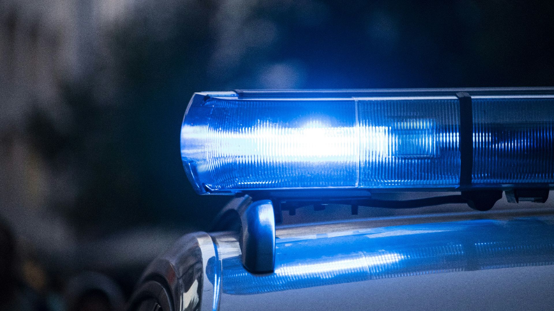 a close up of a police car with its lights on