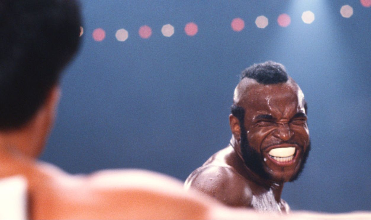 LOS ANGELES, CALIFORNIA - CIRCA 1982: Actor Mr. T, as boxer Clubber Lang, loads up a powerful punch for Rocky Balboa on the set of Rocky III in May of 1982 in Los Angeles, California.