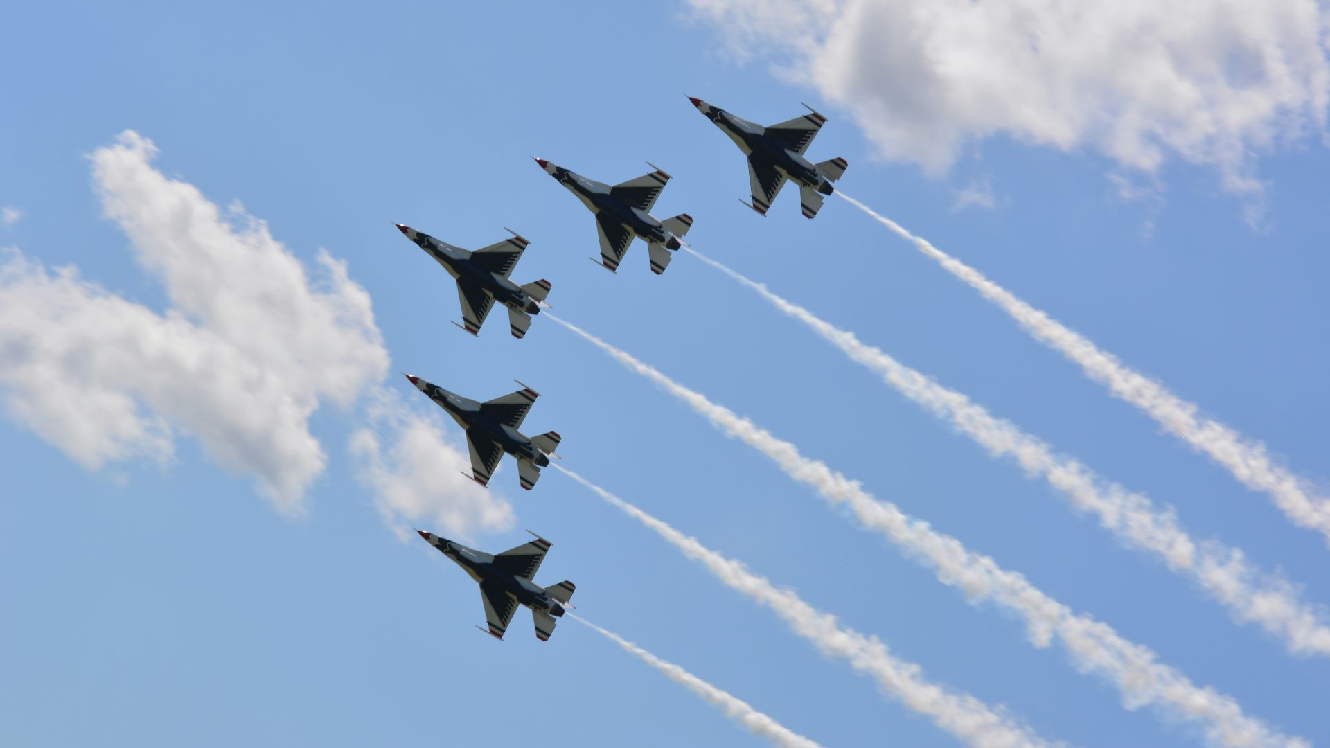 four fighter planes in mid air