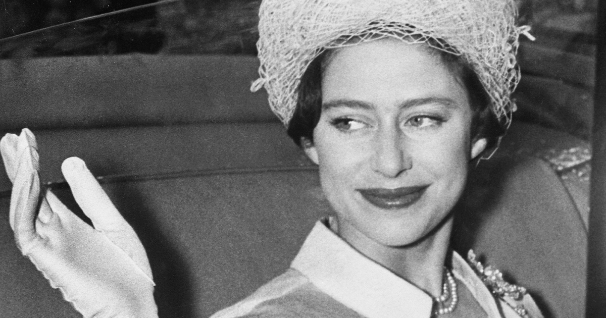 Princess Margaret waves from her coach at Buckingham Palace