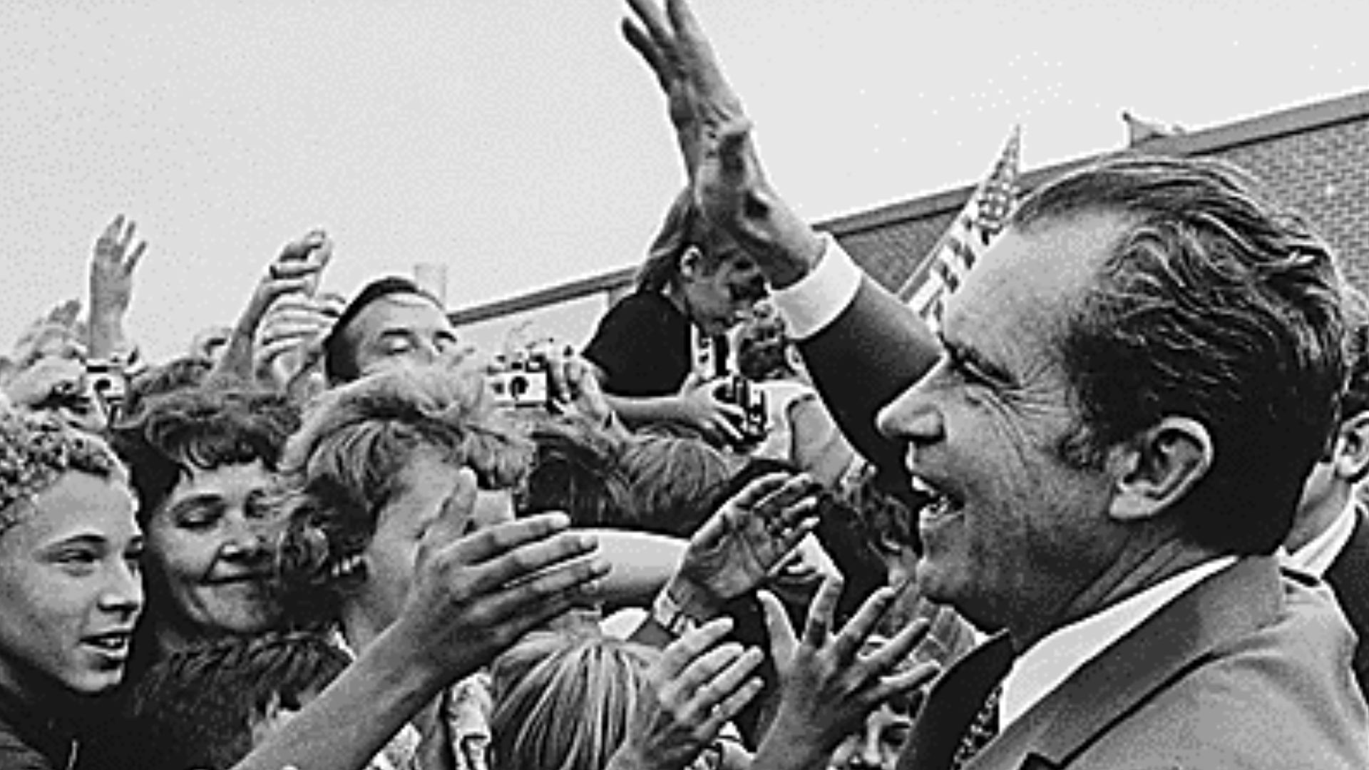 Richard M. Nixon being greeted by school children during a campaign stop.