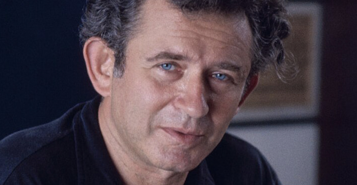  American author Norman Mailer writing at his desk