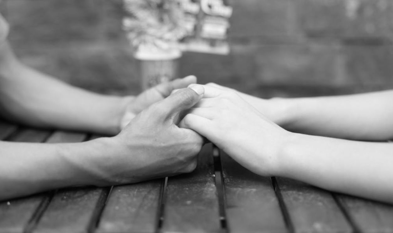 couple holding hands