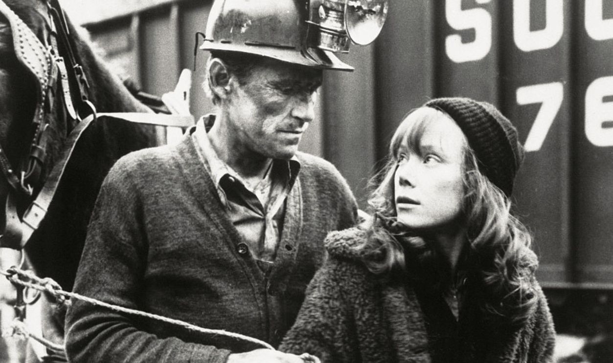 (Original Caption) USA: About People. Last year's crop of films was so bad that Academy of Motion Picture Arts and Sciences members had a hard time finding Oscar nominees. Parade magazine's Hollywood watcher Lloyd Shearer says. Shearer thinks Sissy Spacek should get Best Actress honors for Coal Minder's daughter. She's shown with her film daddy Levon Helm.