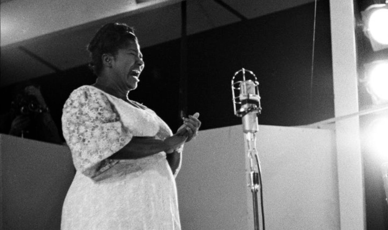 NEWPORT, RI - JULY 1958: Gospel singer Mahalia Jackson performs at the American Jazz Festival (later renamed the Newport Jazz Festival) in July 1958 in Newport, Rhode Island. 