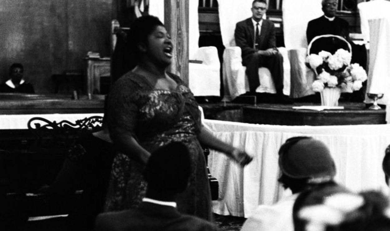 NEWPORT, RI - JULY 1958: Gospel singer Mahalia Jackson performs at a church the weekend of the American Jazz Festival (later renamed the Newport Jazz Festival) in July 1958 in Newport, Rhode Island. 