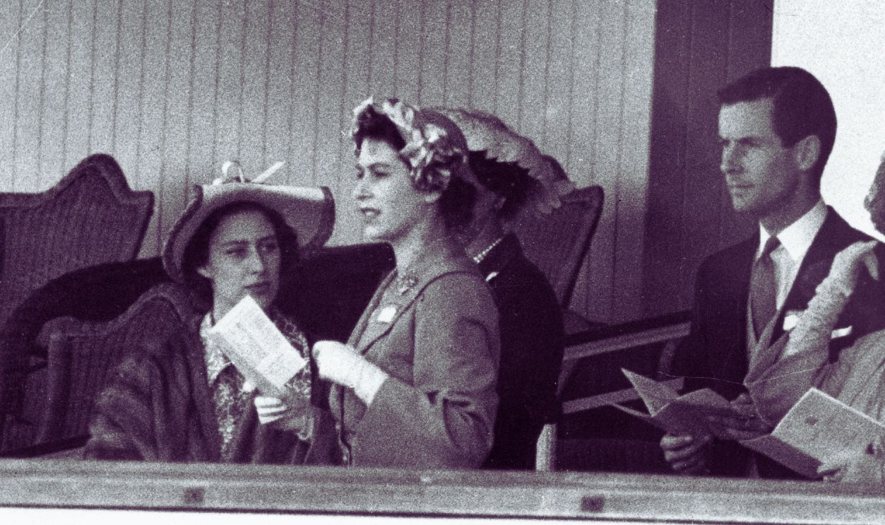 Princess Margaret (L), Princess Elizabeth and Group Captain Peter Townsend gather June 13, 1951 in the Royal Box at Ascot. In 1955 Princess Margaret was refused permission to marry Townsend, a divorced Royal Air Force captain. Buckingham Palace announced that Princess Margaret died peacefully in her sleep at 1:30AM EST at the King Edward VII Hospital February 9, 2002 in London.