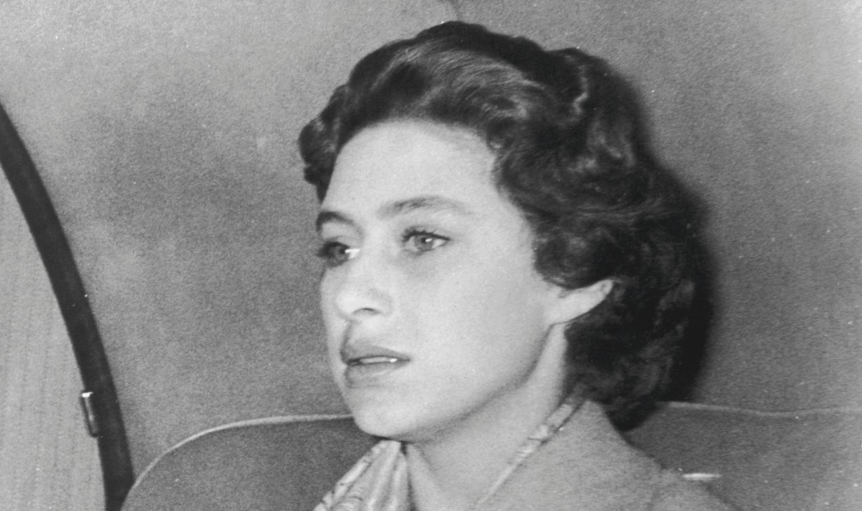Princess Margaret returns to Clarence House October 17, 1955 after a weekend in the country where Group Captain Peter Townsend was also a guest. The decision not to marry Townsend was announced October 31, 1955. Buckingham Palace announced that Princess Margaret died peacefully in her sleep at 1:30AM EST at the King Edward VII Hospital February 9, 2002 in London.