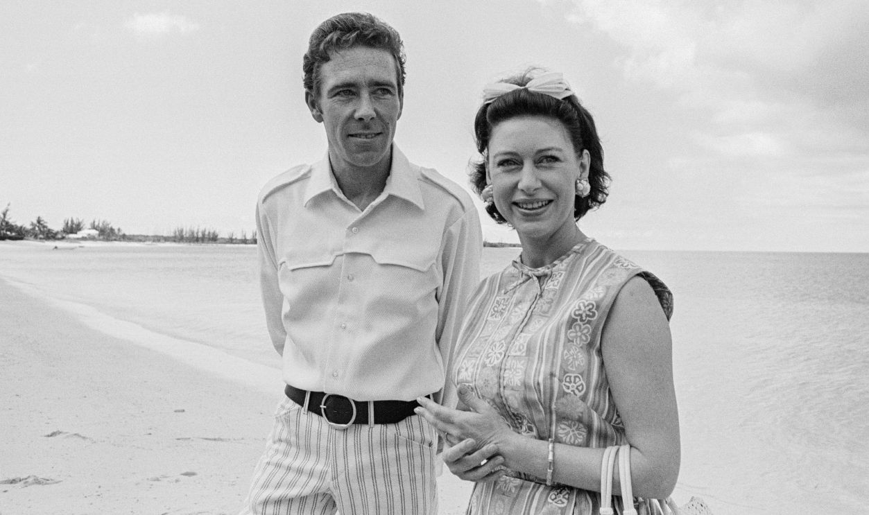 Antony Armstrong-Jones, 1st Earl of Snowden, poses with his wife Princess Margaret on a beach in Nassau, Bahamas during a holiday, March 13th 1967. 